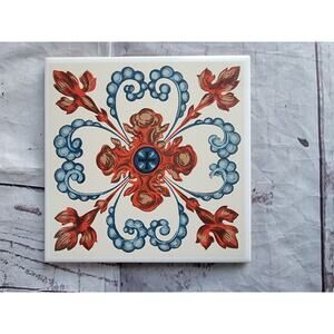 decorative ceramic tile featuring a vintage Portuguese-style botanical